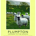 Poster of picture which features on front page of Plumpton Walks booklet. It is a picture of a field of sheep and has the words PLUMPTON Gateway to the Downs written at the bottom of the poster